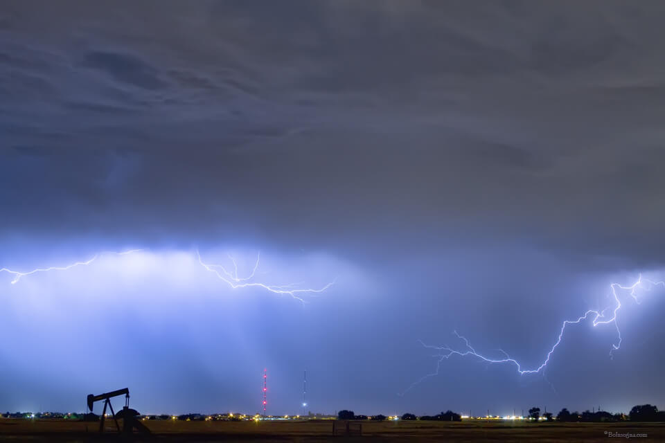 Lightning Strikes Above Oil Field Art Print